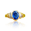 Bague de fiançailles avec saphir bleu taille ovale et diamant taille baguette