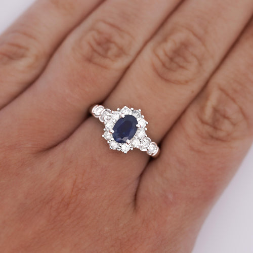 1.16 Carat Oval Blue Sapphire and Diamond Textured Halo Platinum Ring