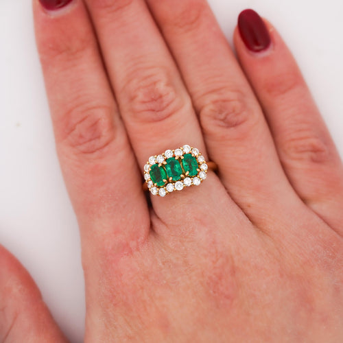 1.22 Carat Emerald & Diamond 18K Gold Halo Three Stone Band Ring