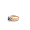 1.22 Carat Oval Cut Blue Sapphire with Baguette Cut Diamonds in 14k Gold Ring