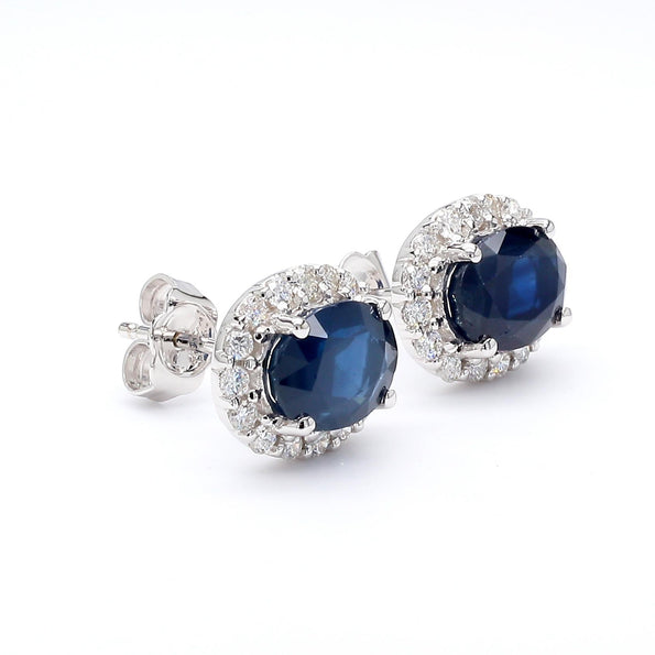3.70 Carat Oval Dark Blue Sapphire & 0.48 Carat Diamond Halo 18K White Gold Stud