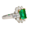 4.42 Carat TW Colombian Emerald with Round & Emerald Cut Diamond Halo Ring