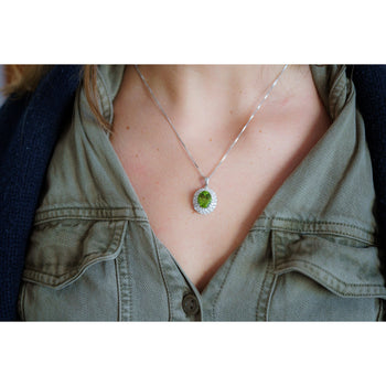 5.03 Carat Oval Cut Peridot Pendant with Round Cut Diamond Halo in 18K White Gold – Assay Jewelers