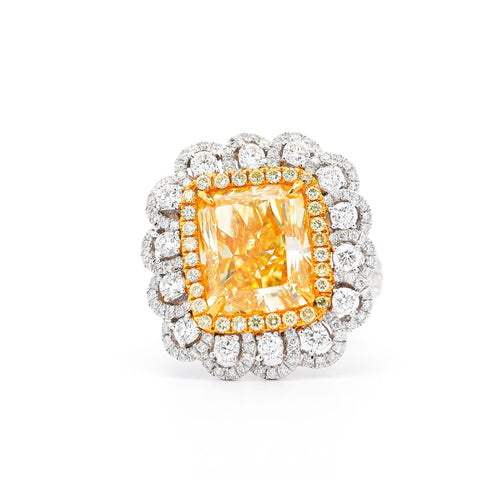 7 Carat Fancy Intense Yellow Radiant Cut Diamond and Diamond Halo Ring | GIA Certified