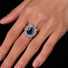 GRS Certified 5.79 Carat Oval Royal Blue Sapphire and Diamond Halo Ring
