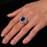 GRS Certified 5.79 Carat Oval Royal Blue Sapphire and Diamond Halo Ring