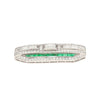 Platinum and 18K White Gold Brooch with Diamonds and Emerald