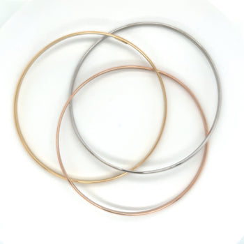 Tri-Color Interlocking Bangle in 18k White, Rose, and Yellow Gold – Assay Jewelers